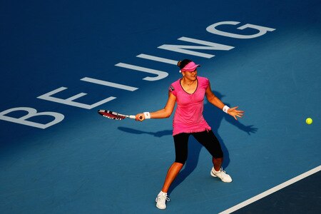 BEIJING - OCTOBER 09:  Nadia Petrova of Russia returns a shot against Peng Shuai of China in the quarter-finals during day eight of the 2009 China Open at the National Tennis Centre on October 9, 2009 in Beijing, China.  <br /><br /><span class="help">(Photo by Feng Li/Getty Images)</span>