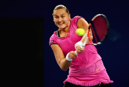 BEIJING - OCTOBER 09:  Nadia Petrova of Russia returns a shot against Peng Shuai of China in the quarter-finals during day eight of the 2009 China Open at the National Tennis Centre on October 9, 2009 in Beijing, China.  <br /><br /><span class="help">(Photo by Feng Li/Getty Images)</span>