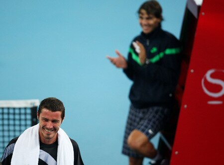 BEIJING - OCTOBER 09: Marat Safin (L) of Russia announces his retirement at the end of this year after  losing his quarter-final match against Rafael Nadal of Spain during day eight of the 2009 China Open at the National Tennis Centre on October 9, 2009 in Beijing, China. <br /><br /><span class="help">(Photo by Feng Li/Getty Images)</span>