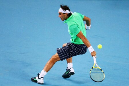 BEIJING - OCTOBER 09:  Rafael Nadal of Spain returns a backhand against Marat Safin of Russia during their quarter-final match on day eight of the 2009 China Open at the National Tennis Centre on October 9, 2009 in Beijing, China.  <br /><br /><span class="help">(Photo by Feng Li/Getty Images)</span>