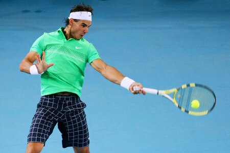 BEIJING - OCTOBER 09:  Rafael Nadal of Spain returns a forehand against Marat Safin of Russia during their quarter-final match on day eight of the 2009 China Open at the National Tennis Centre on October 9, 2009 in Beijing, China.  <br /><br /><span class="help">(Photo by Feng Li/Getty Images)</span>