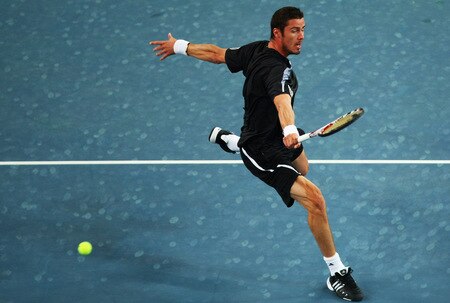 BEIJING - OCTOBER 09:  Marat Safin of Russia returns a shot against  Rafael Nadal of Spain in the quarter-finals during day eight of the 2009 China Open at the National Tennis Centre on October 9, 2009 in Beijing, China.  <br /><br /><span class="help">(Photo by Feng Li/Getty Images)</span>