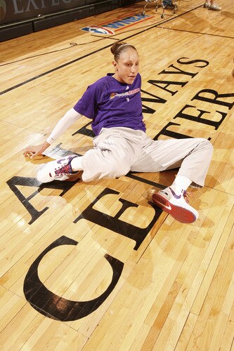 PHOENIX - OCTOBER 9: Diana Taurasi #3 of the Phoenix Mercury stretches prior to Game Five of the WNBA Finals on October 9, 2009 at US Airways Center in Phoenix, Arizona. <br /><br /><span class="help">(Photo by Bill Baptist/NBAE via Getty Images)</span>
