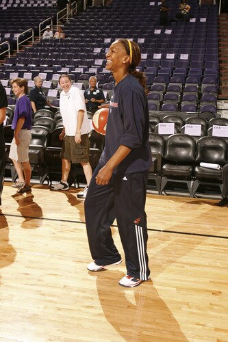 PHOENIX - OCTOBER 9: Tamika Catchings #24 of the Indiana Fever loosens up prior to Game Five of the WNBA Finals on October 9, 2009 at US Airways Center in Phoenix, Arizona. <br /><br /><span class="help">(Photo by Bill Baptist/NBAE via Getty Images)</span>