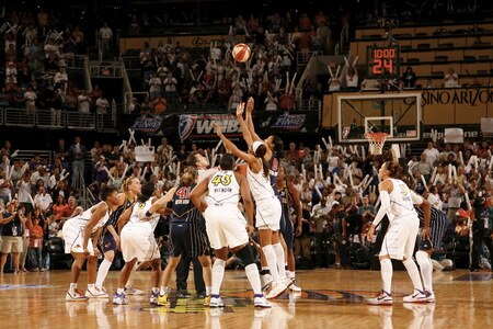 PHOENIX - OCTOBER 9: Tammy Sutton-Brown #8 of the Indiana Fever jumps ball against Tangela Smith #50 of the Phoenix Mercury during Game Five of the WNBA Finals on October 9, 2009 at US Airways Center in Phoenix, Arizona. <br /><br /><span class="help">(Photo by Bill Baptist/NBAE via Getty Images)</span>