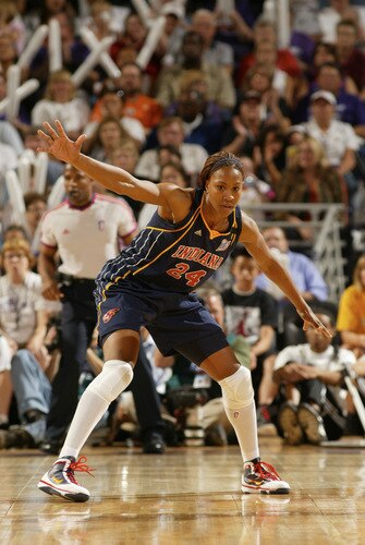 PHOENIX - OCTOBER 9: Tamika Catchings #24 of the Indiana Fever plays defense against the Phoenix Mercury during Game Five of the WNBA Finals on October 9, 2009 at US Airways Center in Phoenix, Arizona. <br /><br /><span class="help">(Photo by Bill Baptist/NBAE via Getty Images)</span>