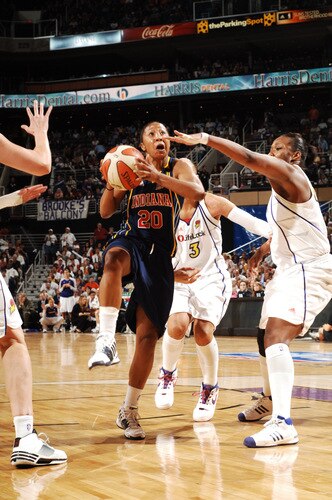 PHOENIX - OCTOBER 9: Briann January #20 of the Indiana Fever drives for a shot against the Phoenix Mercury in Game five of the WNBA Finals played on October 9, 2009 at U.S. Airways Center in Phoenix, Arizona. <br /><br /><span class="help">(Photo by Barry Gossage/NBAE via Getty Images)</span>