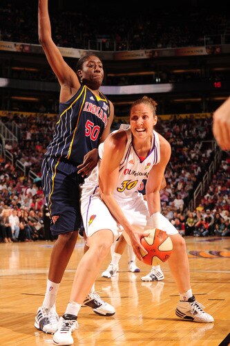 PHOENIX - OCTOBER 9: Nicole Ohlde #30 of the Phoenix Mercury looks to get around Jessica Davenport #50 of the Indiana Fever in Game five of the WNBA Finals played on October 9, 2009 at U.S. Airways Center in Phoenix, Arizona. <br /><br /><span class="help">(Photo by Barry Gossage/NBAE via Getty Images)</span>