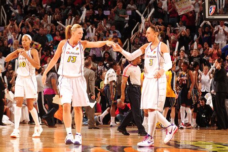PHOENIX - OCTOBER 9: Penny Taylor #13 and Diana Taurasi #3 of the Phoenix Mercury congratulate each other on a good first half heading into the halftime break as the Mercury host the Indiana Fever in Game five of the WNBA Finals played on October 9, 2009 at U.S. Airways Center in Phoenix, Arizona. <br /><br /><span class="help">(Photo by Barry Gossage/NBAE via Getty Images)</span>