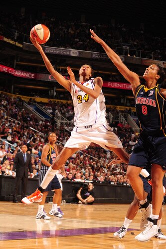 PHOENIX - OCTOBER 9: Dawanna Bonner #24 of the Phoenix Mercury drives for a shot past Tammy Sutton-Brown #8 of the Indiana Fever in Game five of the WNBA Finals played on October 9, 2009 at U.S. Airways Center in Phoenix, Arizona. <br /><br /><span class="help">(Photo by Barry Gossage/NBAE via Getty Images)</span>