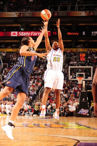 PHOENIX - OCTOBER 9: Cappie Pondexter #23 of the Phoenix Mercury puts a shot up over Tammy Sutton-Brown #8 of the Indiana Fever in Game five of the WNBA Finals played on October 9, 2009 at U.S. Airways Center in Phoenix, Arizona. <br /><br /><span class="help">(Photo by Barry Gossage/NBAE via Getty Images)</span>