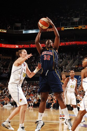 PHOENIX - OCTOBER 9: Ebony Hoffman #32 of the Indiana Fever pulls down a rebound against the Phoenix Mercury in Game five of the WNBA Finals played on October 9, 2009 at U.S. Airways Center in Phoenix, Arizona. <br /><br /><span class="help">(Photo by Barry Gossage/NBAE via Getty Images)</span>
