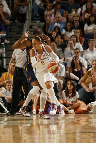 PHOENIX - OCTOBER 9: Diana Taurasi #3 of the Phoenix Mercury drives against Tamika Catchings #24 of the Indiana Fever during Game Five of the WNBA Finals on October 9, 2009 at US Airways Center in Phoenix, Arizona.  <br /><br /><span class="help">(Photo by Bill Baptist/NBAE via Getty Images)</span>