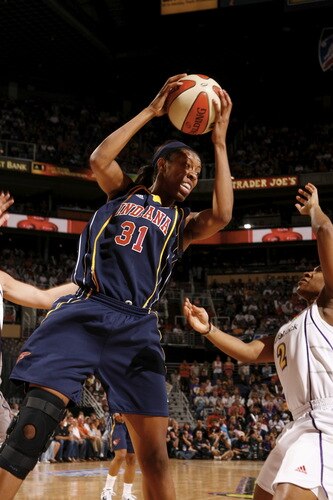 PHOENIX - OCTOBER 9: Jessica Moore #31 of the Indiana Fever rebounds against the Phoenix Mercury during Game Five of the WNBA Finals on October 9, 2009 at US Airways Center in Phoenix, Arizona. <br /><br /><span class="help">(Photo by Bill Baptist/NBAE via Getty Images)</span>