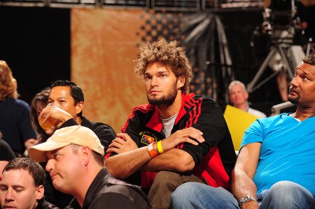PHOENIX - OCTOBER 9: Robin Lopez of the Phoenix Suns watches courtside as the Phoenix Mercury host the Indiana Fever in Game five of the WNBA Finals played on October 9, 2009 at U.S. Airways Center in Phoenix, Arizona. <br /><br /><span class="help">(Photo by Barry Gossage/NBAE via Getty Images)</span>