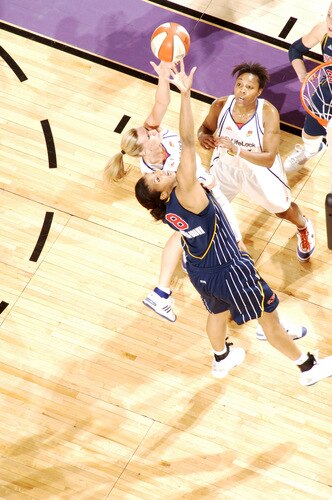 PHOENIX - OCTOBER 9: Penny Taylor #13 of the Phoenix Mercury fights for a rebound with Tammy Sutton-Brown #8 of the Indiana Fever in Game five of the WNBA Finals played on October 9, 2009 at U.S. Airways Center in Phoenix, Arizona. <br /><br /><span class="help">(Photo by Barry Gossage/NBAE via Getty Images)</span>