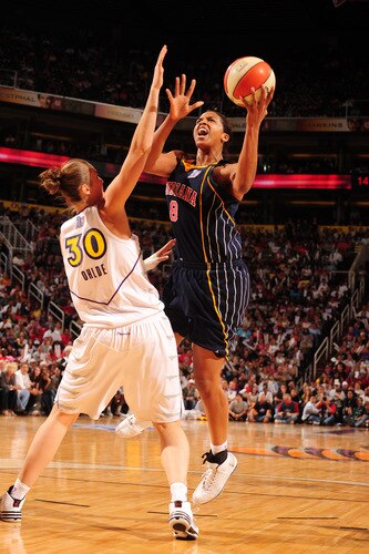 PHOENIX - OCTOBER 9: Tammy Sutton-Brown #8 of the Indiana Fever puts a shot up over Nicole Ohlde #30 of the Phoenix Mercury in Game five of the WNBA Finals played on October 9, 2009 at U.S. Airways Center in Phoenix, Arizona. <br /><br /><span class="help">(Photo by Barry Gossage/NBAE via Getty Images)</span>