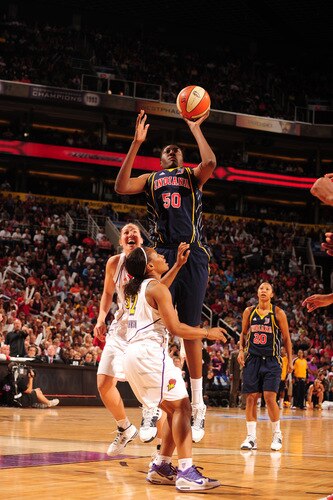 PHOENIX - OCTOBER 9: Jessica Davenport #50 of the Indiana Fever puts a shot up over Temeka Johnson #2 of the Phoenix Mercury in Game five of the WNBA Finals played on October 9, 2009 at U.S. Airways Center in Phoenix, Arizona. <br /><br /><span class="help">(Photo by Barry Gossage/NBAE via Getty Images)</span>