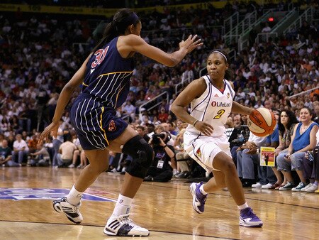 PHOENIX - OCTOBER 10:  Temeka Johnson #2 of the Phoenix Mercury handles the ball under pressure from Jessica Moore #31 of the Indiana Fever in Game Five of the 2009 WNBA Finals at US Airways Center on October 10, 2009 in Phoenix, Arizona.  The Mercury defeated the Fever 94-86.  <br /><br /><span class="help">(Photo by Christian Petersen/Getty Images)</span>