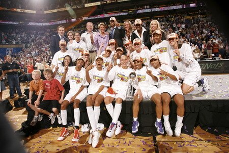 PHOENIX - OCTOBER 9: DeWanna Bonner #24, Tangela Smith #50; Diana Taurasi #3; Temeka Johnson #2 and Le'coe Willingham #43 of the Phoenix Mercury celebrates after defeating the Indiana Fever during Game Five of the WNBA Finals on October 9, 2009 at US Airways Center in Phoenix, Arizona. <br /><br /><span class="help">(Photo by Bill Baptist/NBAE via Getty Images)</span>