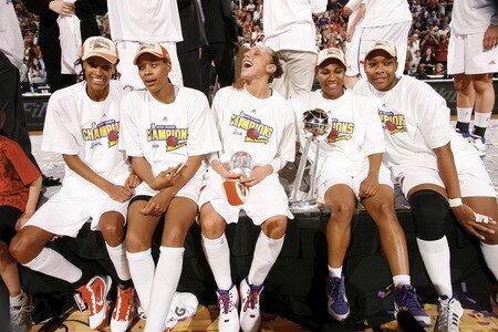 PHOENIX - OCTOBER 9: DeWanna Bonner #24; Tangela Smith #50; Diana Taurasi #3; Temeka Johnson #2 and Le'coe Willingham #43 of the Phoenix Mercury celebrates after defeating the Indiana Fever during Game Five of the WNBA Finals on October 9, 2009 at US Airways Center in Phoenix, Arizona. <br /><br /><span class="help">(Photo by Bill Baptist/NBAE via Getty Images)</span>