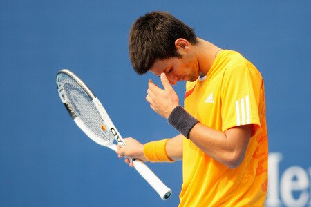 BEIJING - OCTOBER 10:  Novak Djokovic of Serbia misses a shot against Robin Soderling of Sweden in the Semifinals during day nine of the 2009 China Open at the National Tennis Centre on October 10, 2009 in Beijing, China.  <br /><br /><span class="help">(Photo by Feng Li/Getty Images)</span>
