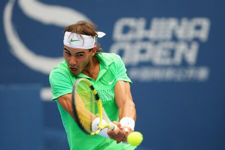BEIJING - OCTOBER 10:  Rafael Nadal of Spain returns a shot against Marin Cilic of Croatia in the Semifinals during day nine of the 2009 China Open at the National Tennis Centre on October 10, 2009 in Beijing, China.  <br /><br /><span class="help">(Photo by Feng Li/Getty Images)</span>