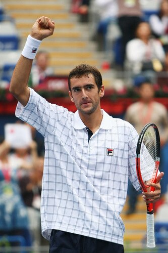 BEIJING - OCTOBER 10:   Marin Cilic of Croatia celebrates winning against Rafael Nadal of Spain in the Semifinals during day nine of the 2009 China Open at the National Tennis Centre on October 10, 2009 in Beijing, China.  <br /><br /><span class="help">(Photo by Feng Li/Getty Images)</span>