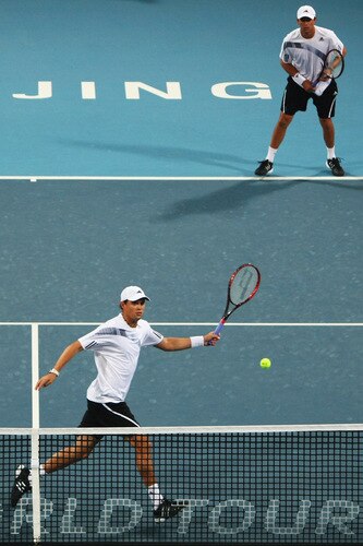 BEIJING - OCTOBER 10:  Bob Bryan and Mike Bryan of USA returns a shot against Julien Benneteau and Jeremy Chardy of France in the Semifinals during day nine of the 2009 China Open at the National Tennis Centre on October 10, 2009 in Beijing, China.  <br /><br /><span class="help">(Photo by Feng Li/Getty Images)</span>