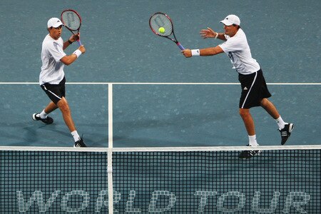 BEIJING - OCTOBER 10:  Bob Bryan and Mike Bryan of USA returns a shot against Julien Benneteau and Jeremy Chardy of France in the Semifinals during day nine of the 2009 China Open at the National Tennis Centre on October 10, 2009 in Beijing, China.  <br /><br /><span class="help">(Photo by Feng Li/Getty Images)</span>