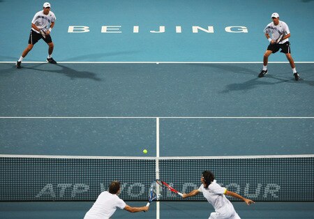 BEIJING - OCTOBER 10:  Julien Benneteau and Jeremy Chardy of France (Below) return a shot against Bob Bryan and Mike Bryan of USA in the Semifinals during day nine of the 2009 China Open at the National Tennis Centre on October 10, 2009 in Beijing, China.  <br /><br /><span class="help">(Photo by Feng Li/Getty Images)</span>