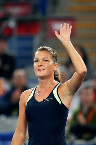 BEIJING - OCTOBER 10:  Agnieszka Radwanska of Poland celebrates winning against Marion Bartoli of France in the Semifinals during day nine of the 2009 China Open at the National Tennis Centre on October 10, 2009 in Beijing,  <br /><br /><span class="help">(Photo by Feng Li/Getty Images)</span>