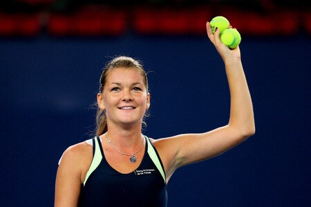 BEIJING - OCTOBER 10:  Agnieszka Radwanska of Poland celebrates winning against Marion Bartoli of France in the Semifinals during day nine of the 2009 China Open at the National Tennis Centre on October 10, 2009 in Beijing,  <br /><br /><span class="help">(Photo by Feng Li/Getty Images)</span>