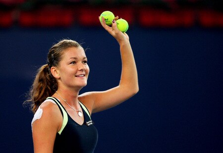 BEIJING - OCTOBER 10:  Agnieszka Radwanska of Poland celebrates winning against Marion Bartoli of France in the Semifinals during day nine of the 2009 China Open at the National Tennis Centre on October 10, 2009 in Beijing,  <br /><br /><span class="help">(Photo by Feng Li/Getty Images)</span>