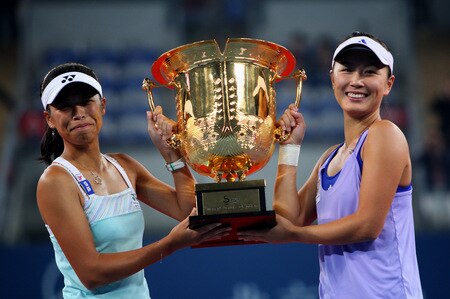 BEIJING - OCTOBER 10:  (L-R) Hsieh Su-Wei of Taiwan and Peng Shuai of China pose with the trophies after the women's final match during day nine of the 2009 China Open at the National Tennis Centre on October 10, 2009 in Beijing, China. Hsieh Su-Wei of Taiwan and Peng Shuai of China win the tournament.  <br /><br /><span class="help">(Photo by Feng Li/Getty Images)</span>