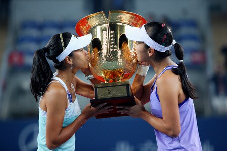 BEIJING - OCTOBER 10:  (L-R) Hsieh Su-Wei of Taiwan and Peng Shuai of China pose with the trophies after the women's final match during day nine of the 2009 China Open at the National Tennis Centre on October 10, 2009 in Beijing, China. Hsieh Su-Wei of Taiwan and Peng Shuai of China win the tournament.  <br /><br /><span class="help">(Photo by Feng Li/Getty Images)</span>