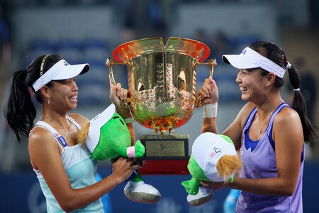BEIJING - OCTOBER 10: (L-R) Hsieh Su-Wei of Taiwan and Peng Shuai of China pose with the trophies after the women's final match during day nine of the 2009 China Open at the National Tennis Centre on October 10, 2009 in Beijing, China. Hsieh Su-Wei of Taiwan and Peng Shuai of China win the tournament. <br /><br /><span class="help">(Photo by Feng Li/Getty Images)</span>