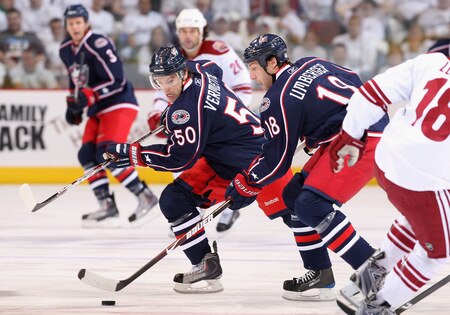 GLENDALE, AZ - OCTOBER 10:  R.J. Umberger #18 and Antoine Vermette #50 of the Columbus Blue Jackets skate after the puck during the NHL game against the Phoenix Coyotes at Jobing.com Arena on October 10, 2009 in Glendale, Arizona.  <br /><br /><span class="help">(Photo by Christian Petersen/Getty Images)</span>