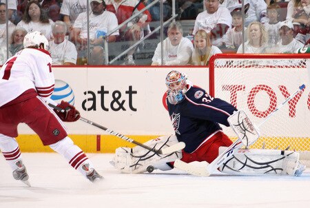 GLENDALE, AZ - OCTOBER 10:  Goaltender Mathieu Garon #32 of the Columbus Blue Jackets makes a sliding pad save on the shot from Martin Hanzal #11 of the Phoenix Coyotes during the NHL game at Jobing.com Arena on October 10, 2009 in Glendale, Arizona.  <br /><br /><span class="help">(Photo by Christian Petersen/Getty Images)</span>