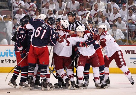 GLENDALE, AZ - OCTOBER 10: Zbynek Michalek #4 of the Phoenix Coyotes reaches over to Rick Nash #61 of the Columbus Blue Jackets during a scrum in the NHL game at Jobing.com Arena on October 10, 2009 in Glendale, Arizona. The Blue Jackets defeated the Coyotes 2-0.  <br /><br /><span class="help">(Photo by Christian Petersen/Getty Images)</span>