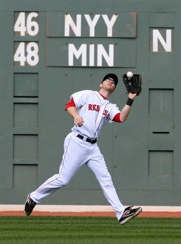 BOSTON - OCTOBER 11:  Jason Bay #44 of the Boston Red Sox catches a Torii Hunter #48 of the Los Angeles Angels of Anaheim fly ball in the third inning of Game Three of the ALDS during the 2009 MLB Playoffs at Fenway Park on October 11, 2009 in Boston,  Massachusetts. <br /><br /><span class="help">(Photo by Jim Rogash/Getty Images)</span>