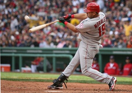 BOSTON - OCTOBER 11: Kendry Morales #19 of the Los Angeles Angels of Anaheim hits a home run against the Boston Red in the fourth inning of Game Three of the ALDS Sox during the 2009 MLB Playoffs at Fenway Park on October 11, 2009 in Boston, Massachusetts.  <br /><br /><span class="help">(Photo by Elsa/Getty Images)</span>