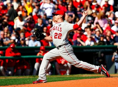 BOSTON - OCTOBER 11:  Starting pitcher Scott Kazmir #22 of the Los Angeles Angels of Anaheim pitches in the first inning against the Boston Red Sox in Game Three of the ALDS during the 2009 MLB Playoffs at Fenway Park on October 11, 2009 in Boston, Massachusetts. <br /><br /><span class="help">(Photo by Jim Rogash/Getty Images)</span>