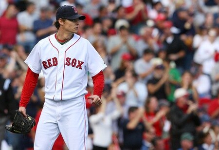BOSTON - OCTOBER 11:  Clay Buchholz #61 of the Boston Red Sox looks on from the mound in the second inning against the Los Angeles Angels of Anaheim in Game Three of the ALDS during the 2009 MLB Playoffs at Fenway Park on October 11, 2009 in Boston,  Massachusetts. <br /><br /><span class="help">(Photo by Jim Rogash/Getty Images)</span>