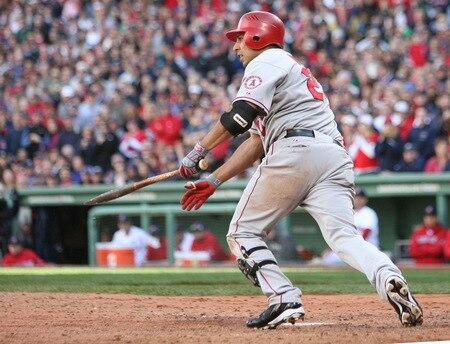 BOSTON - OCTOBER 11: Juan Rivera #20 of the Los Angeles Angels of Anaheim grounded out to score Torii Hunter #48 in the sixth inning of Game Three of the ALDS against the Boston Red Sox during the 2009 MLB Playoffs at Fenway Park on October 11, 2009 in Boston, Massachusetts.  <br /><br /><span class="help">(Photo by Elsa/Getty Images)</span>