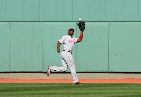 BOSTON - OCTOBER 11:  Torii Hunter #48 of the Los Angeles Angels of Anaheim catches a Kevin Youkilis #20 of the Boston Red Sox pop fly in the fifth inning of Game Three of the ALDS during the 2009 MLB Playoffs at Fenway Park on October 11, 2009 in Boston,  Massachusetts. <br /><br /><span class="help">(Photo by Jim Rogash/Getty Images)</span>