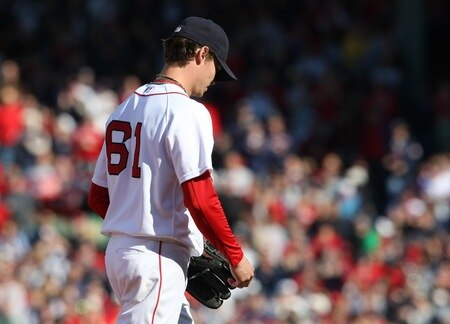 BOSTON - OCTOBER 11:  Starting pitcher Clay Buchholz #61 of the Boston Red Sox is pulled in the sixth inning after loading the bases with no outs against the Los Angeles Angels of Anaheim in Game Three of the ALDS during the 2009 MLB Playoffs at Fenway Park on October 11, 2009 in Boston, Massachusetts. <br /><br /><span class="help">(Photo by Elsa/Getty Images)</span>