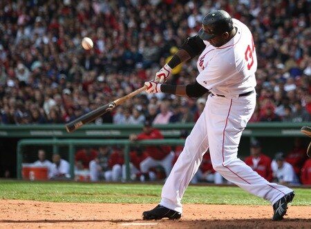 BOSTON - OCTOBER 11:  David Ortiz #34 of the Boston Red Sox hits a foul in the second inning during Game Three of the ALDS against of the Los Angeles Angels of Anaheim during the 2009 MLB Playoffs at Fenway Park on October 11, 2009 in Boston, Massachusetts. <br /><br /><span class="help">(Photo by Elsa/Getty Images)</span>