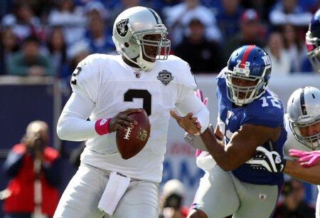 EAST RUTHERFORD, NJ - OCTOBER 11:  JaMarcus Russell #2 of the Oakland Raiders looks to throw a pass against the New York Giants on October 11, 2009 at Giants Stadium in East Rutherford, New Jersey.  <br /><br /><span class="help">(Photo by Jim McIsaac/Getty Images)</span>