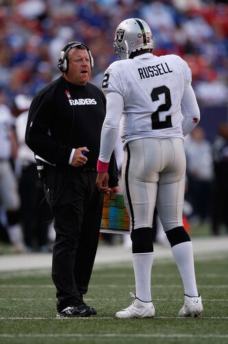 EAST RUTHERFORD, NJ - OCTOBER 11: Head Coach Tom Cable and JaMarcus Russell #2 of the Oakland Raiders talk inbetween plays during the game on October 11, 2009 at Giants Stadium in East Rutherford, New Jersey. <br /><br /><span class="help">(Photo by Jared Wickerham/Getty Images)</span>